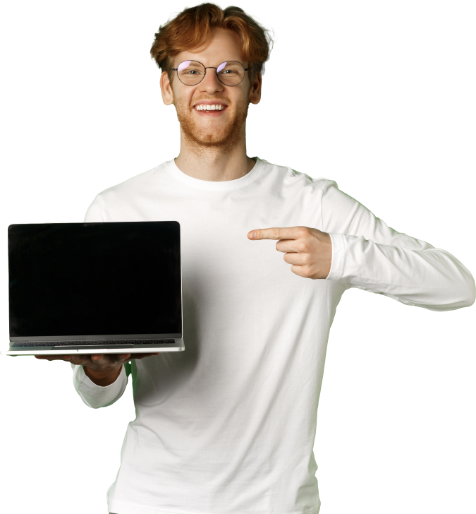 Ginger man holding a laptop